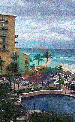 Piscina y playa en el Ritz-Carlton Cancún en el Mar Caribe en México